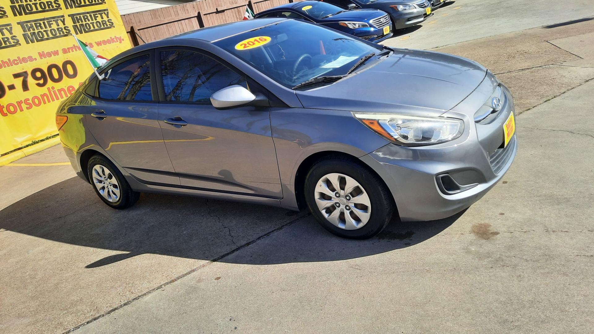 2016 Hyundai Accent (KMHCT4AE9GU) , located at 16710 Clay Rd., Houston, TX, 77084, (281) 859-7900, 29.834864, -95.656166 - Photo#0